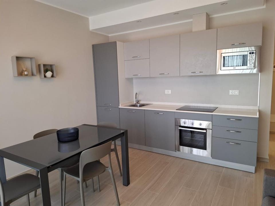 Dining area, dishwasher, oven, stove