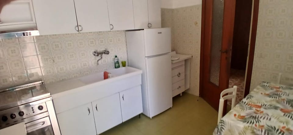Kitchen or kitchenette, oven, stove