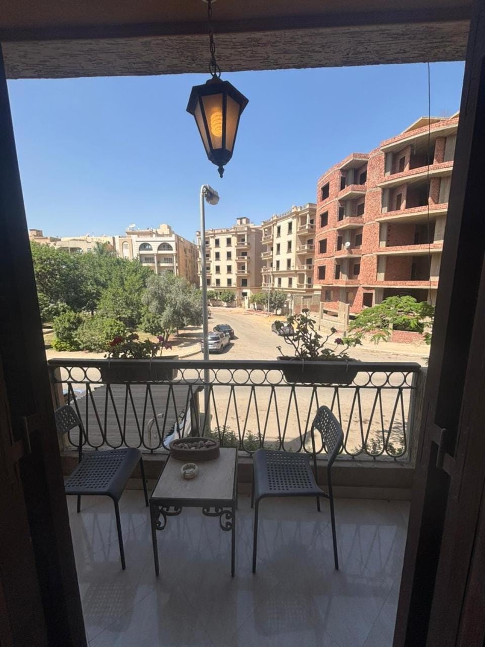 Property building, Neighbourhood, View (from property/room), Balcony/Terrace, Seating area, Street view