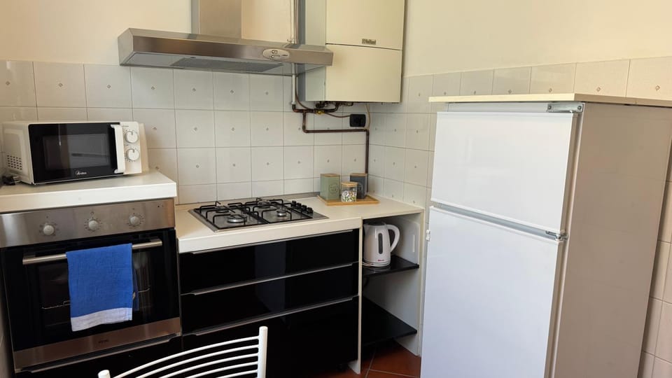 Kitchen or kitchenette, oven, stove