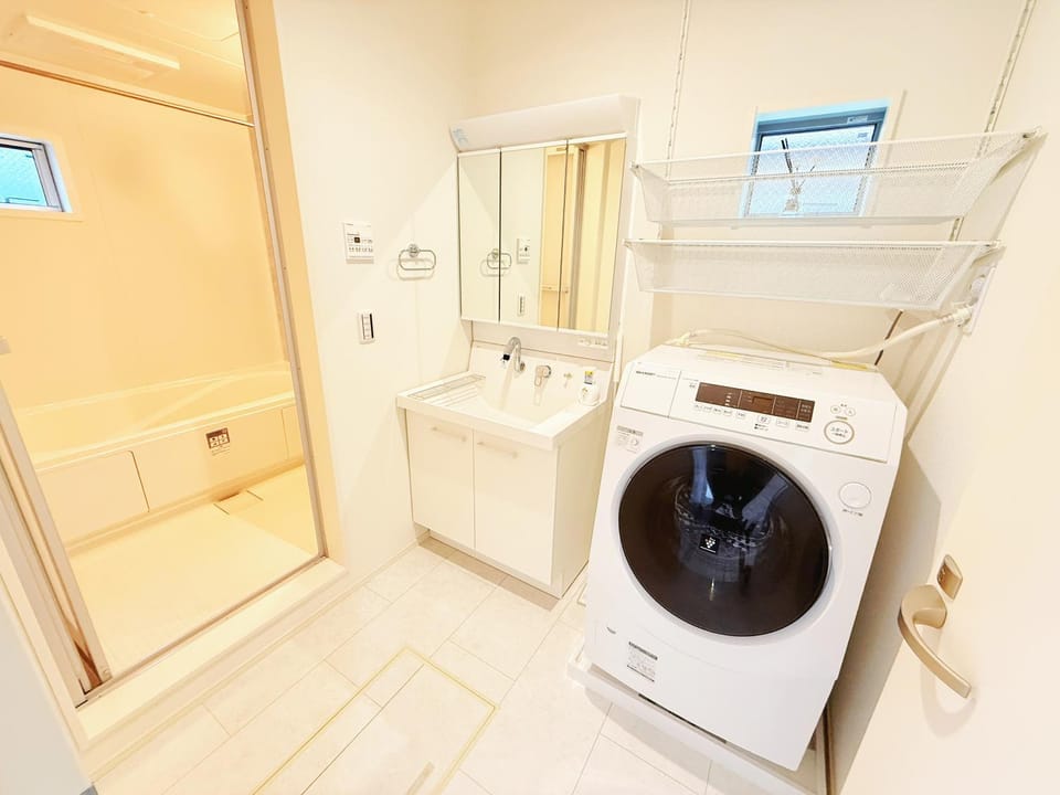 Bathroom, towels, washing machine, dryer