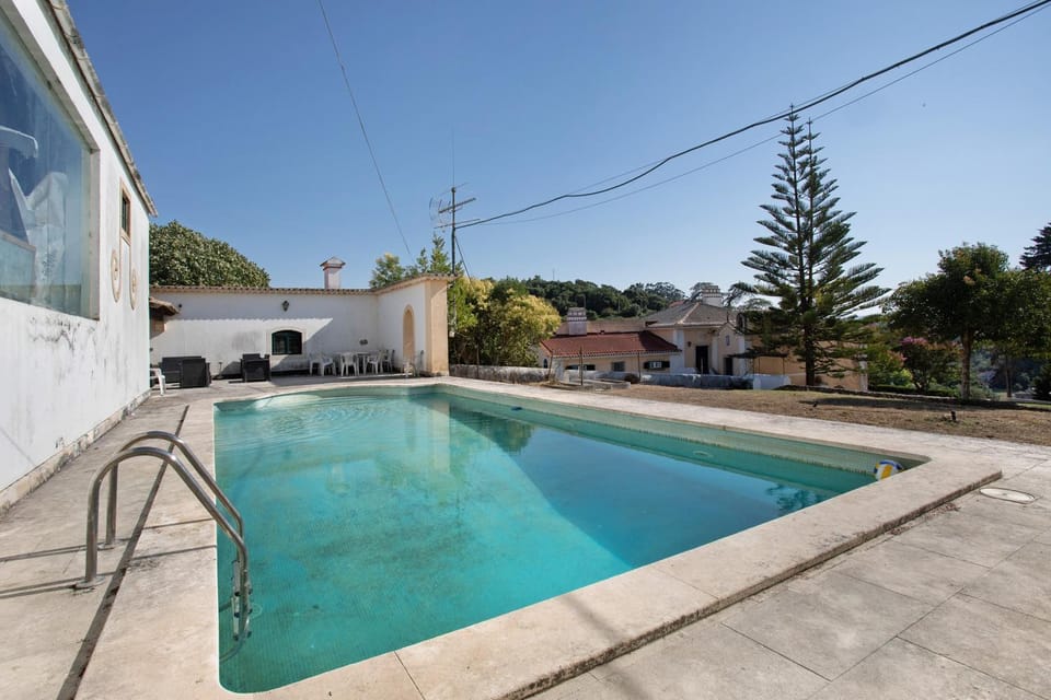 Property building, Living room, Swimming pool