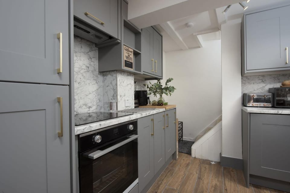 Kitchen or kitchenette, oven, stove