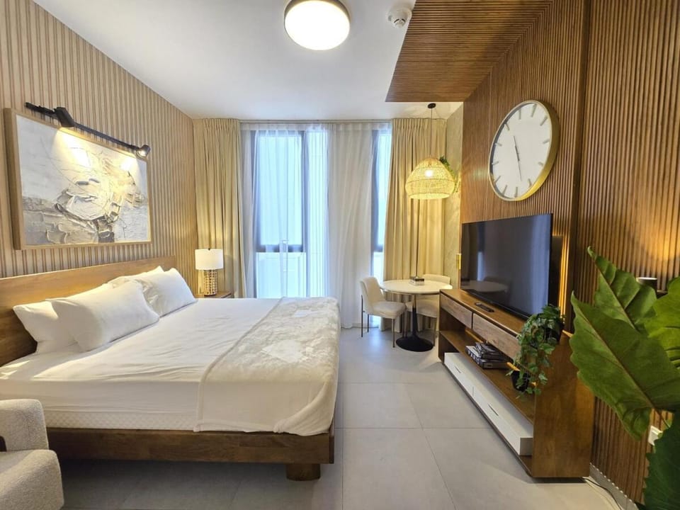 Luxury Apartment in Al Jada Wooden Theme by BlueCloud holidays Apartment in Al Sharjah