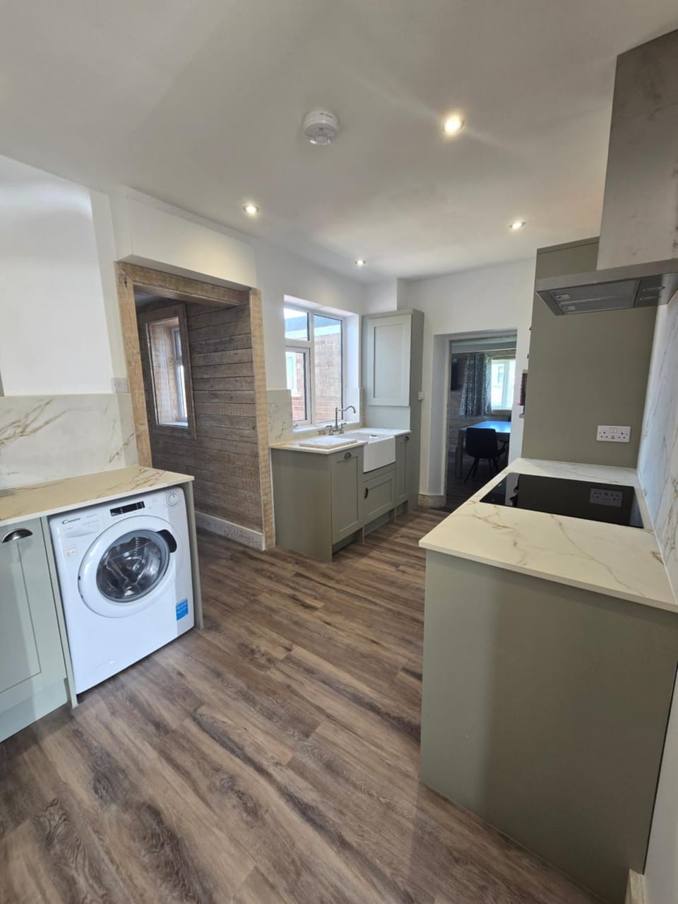 Kitchen or kitchenette, dishwasher, stove, washing machine