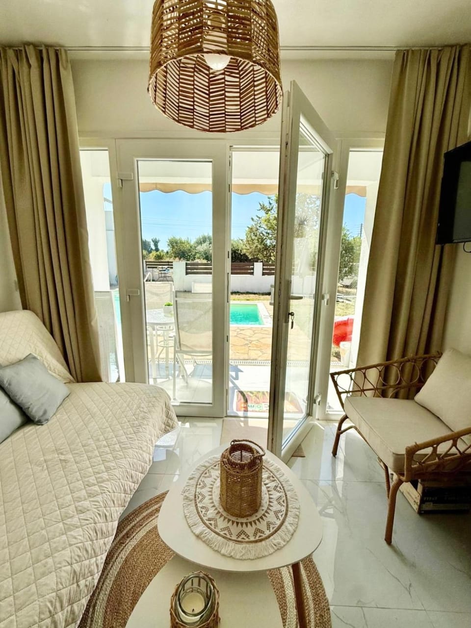 Patio, Bed, Living room, Seating area, Pool view