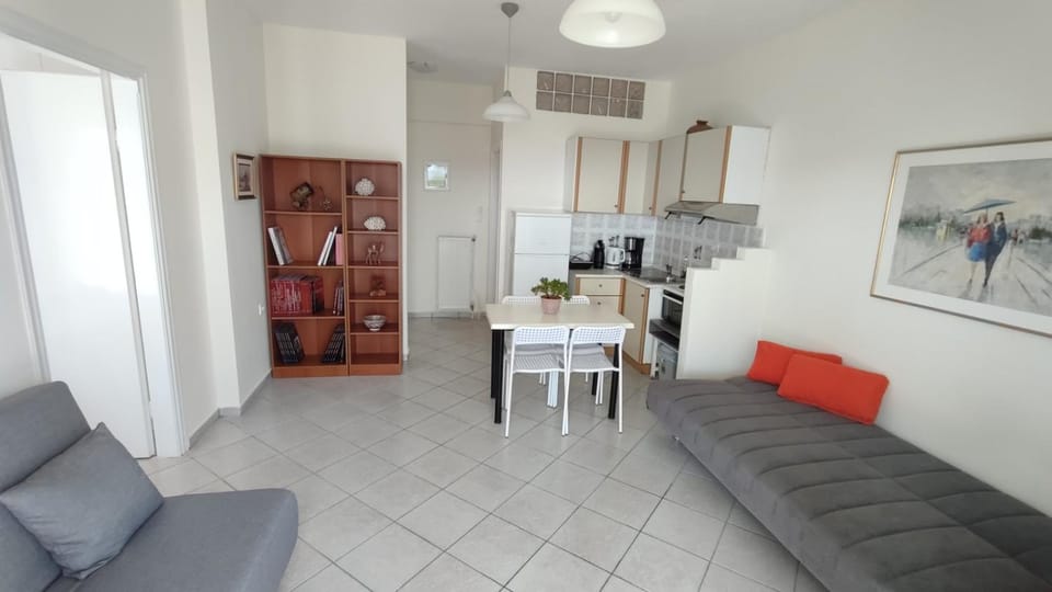 Kitchen or kitchenette, Living room, Seating area, Dining area, stove, air conditioner