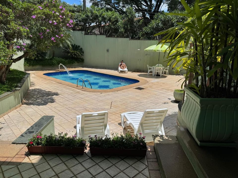 Swimming pool, sunbed