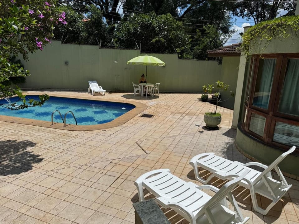 Swimming pool, sunbed