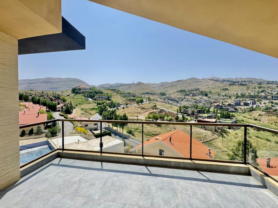 Aria Faqra 3BR w Balcony Apartment in Africa