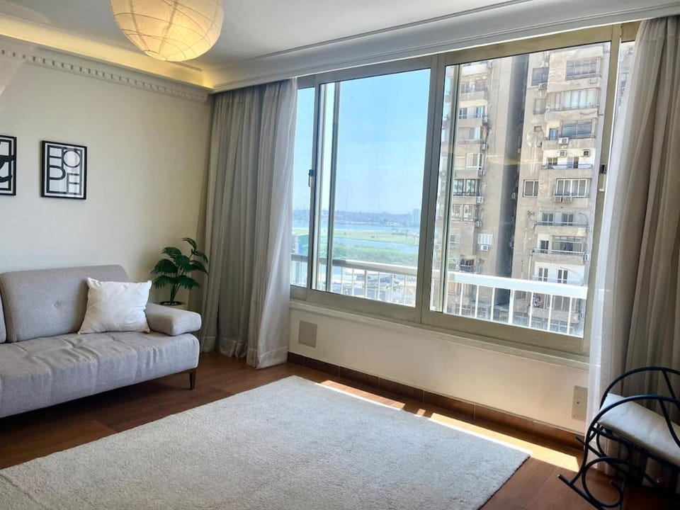 Natural landscape, View (from property/room), Living room, Seating area