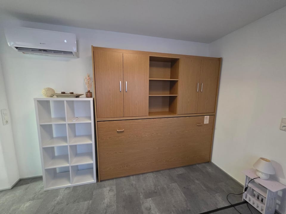 Bed, wardrobe, air conditioner