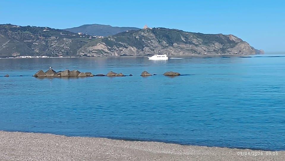 Nearby landmark, Natural landscape, Beach, Mountain view
