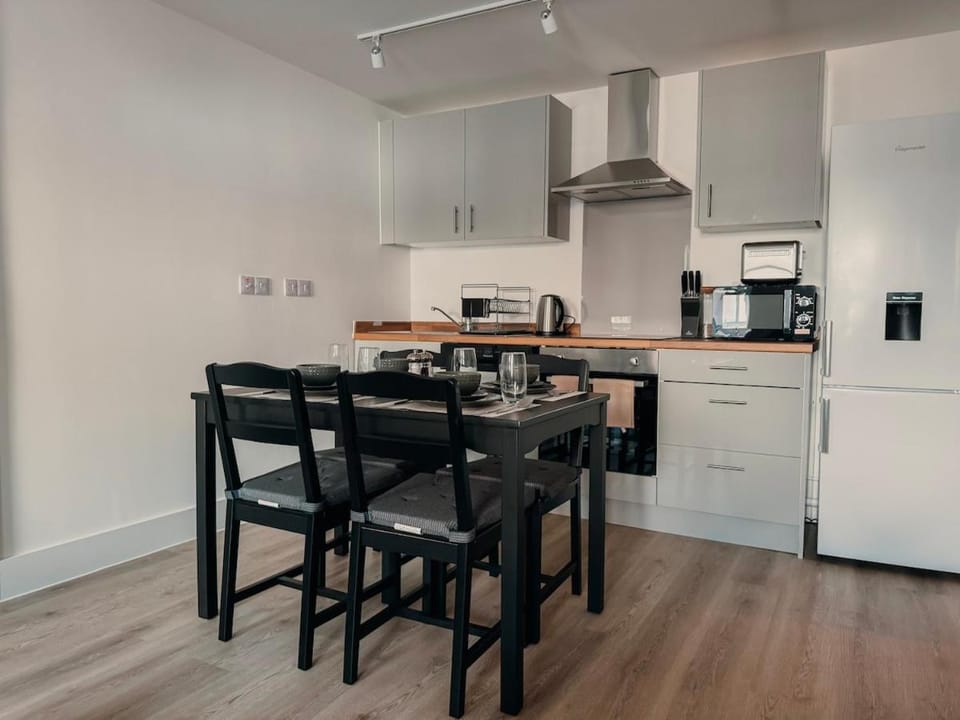 Kitchen or kitchenette, Dining area, dishwasher, oven, stove, toaster