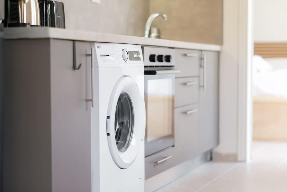 Kitchen or kitchenette, washing machine