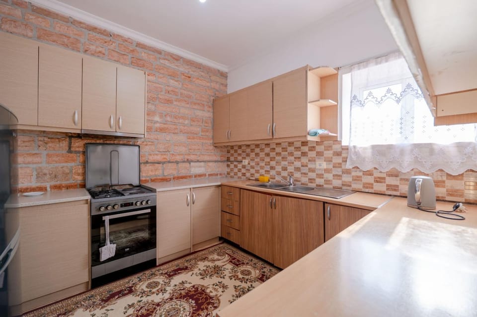Kitchen or kitchenette, oven, stove
