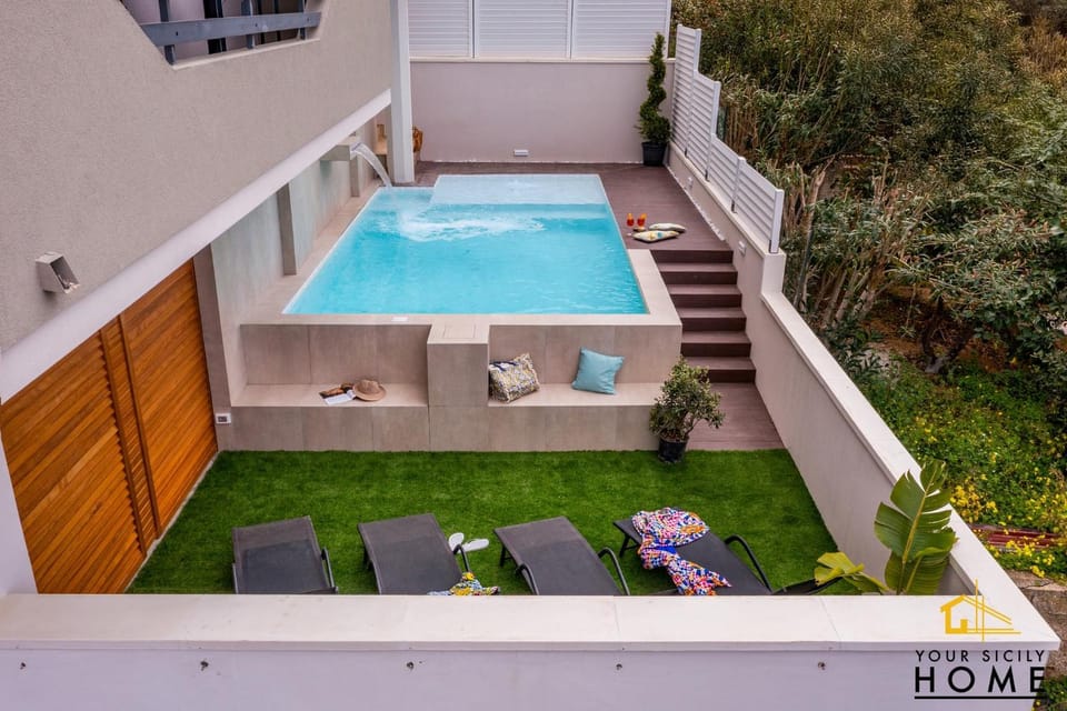 Appartamenti in Villa Syrenis vista mare con piscina riscaldata e campo da bocce Apartment in Alcamo