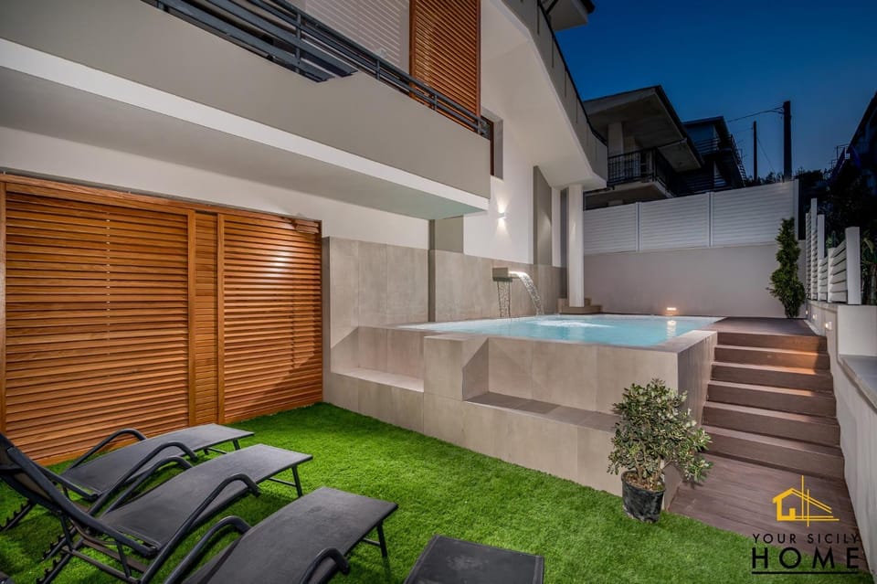 Appartamenti in Villa Syrenis vista mare con piscina riscaldata e campo da bocce Apartment in Alcamo