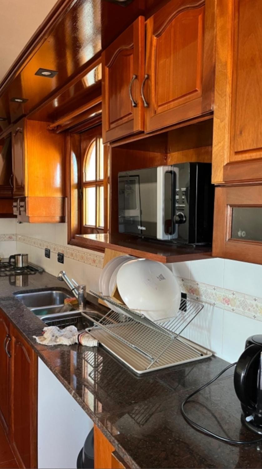 Kitchen or kitchenette, microwave