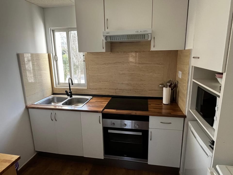 Kitchen or kitchenette, oven, stove, toaster