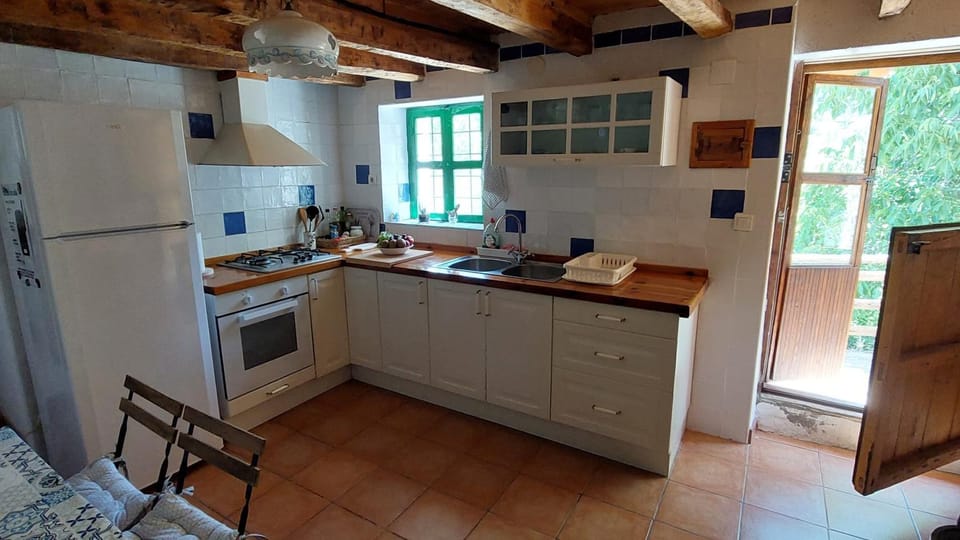 Kitchen or kitchenette, oven, stove, toaster