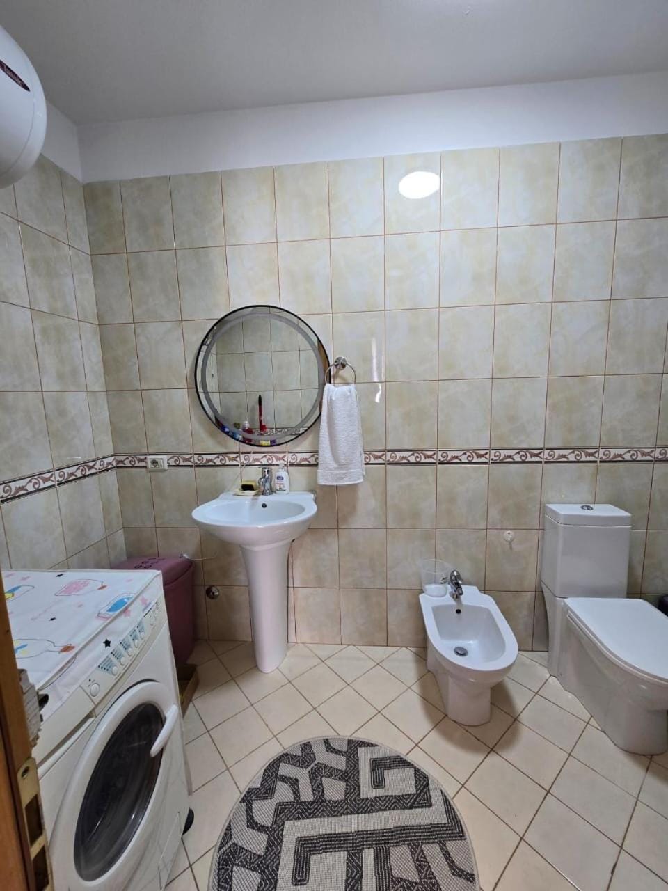 Shower, Toilet, Bathroom, bidet, towels, washing machine, dryer