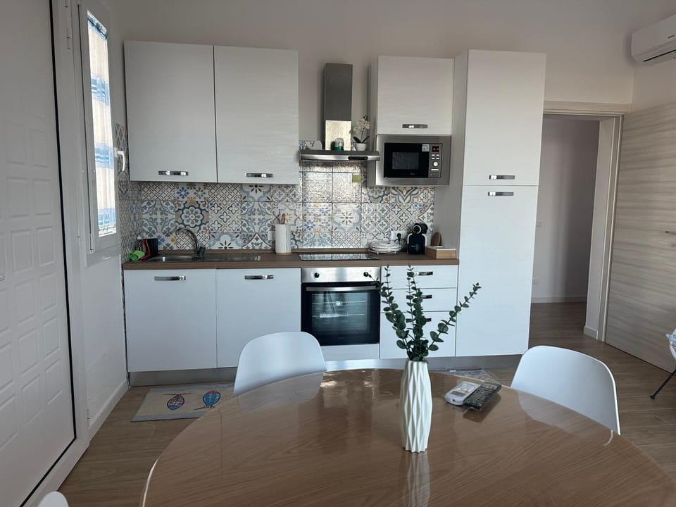 Kitchen or kitchenette, Dining area, dishwasher, oven, stove, toaster