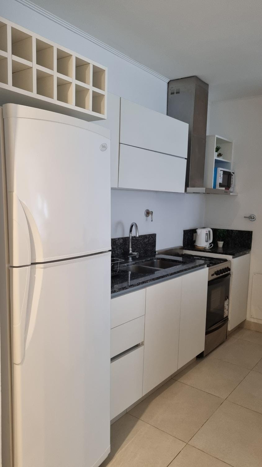 Kitchen or kitchenette, oven, stove