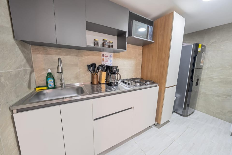 Kitchen or kitchenette, microwave, stove, kitchen
