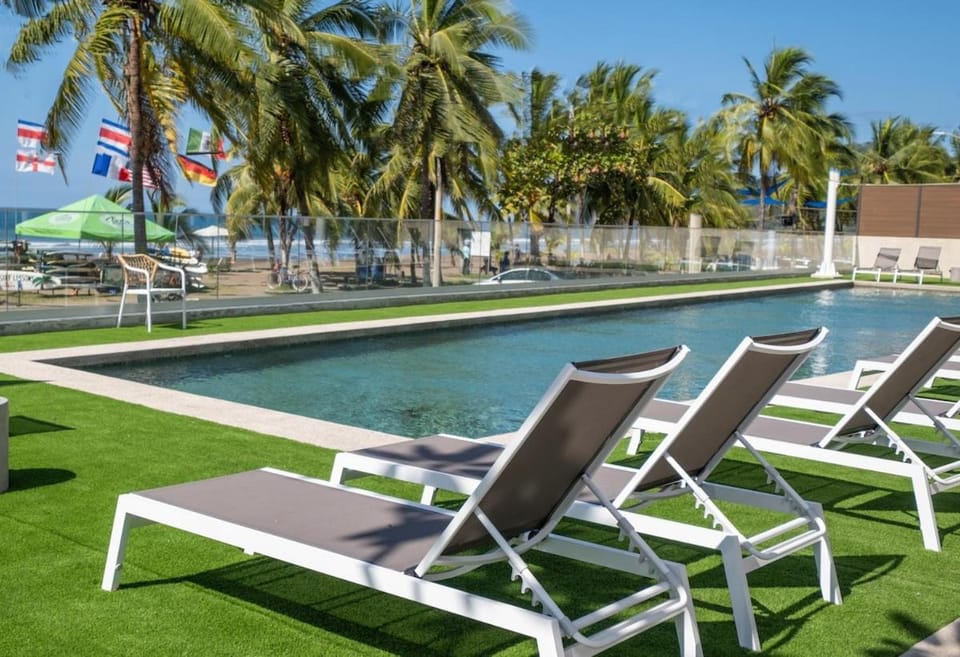 Stylish 1-BR Oceanfront Condo with Panoramic Views Inn in Jaco