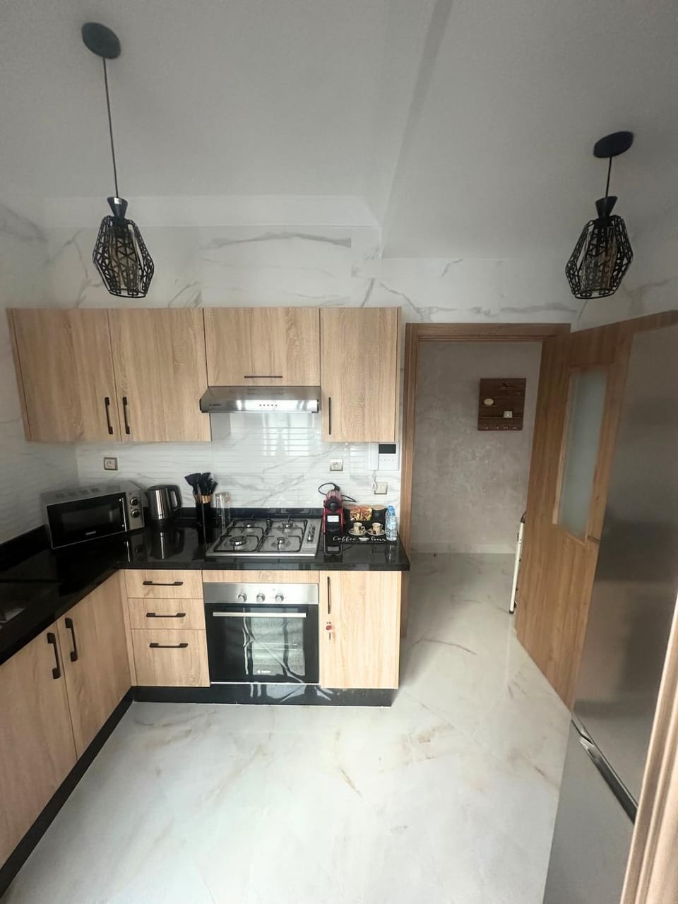 Kitchen or kitchenette, dishwasher, stove