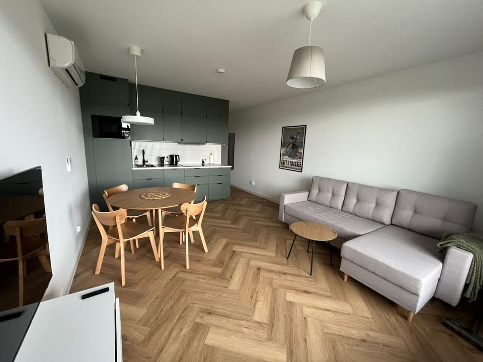 Kitchen or kitchenette, Living room, Seating area, Dining area