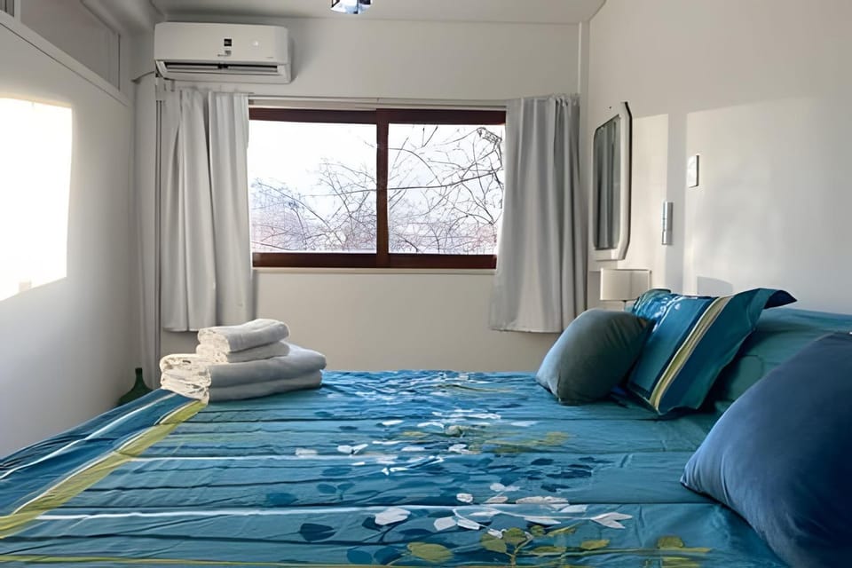 Bed, Photo of the whole room, Bedroom, towels, air conditioner
