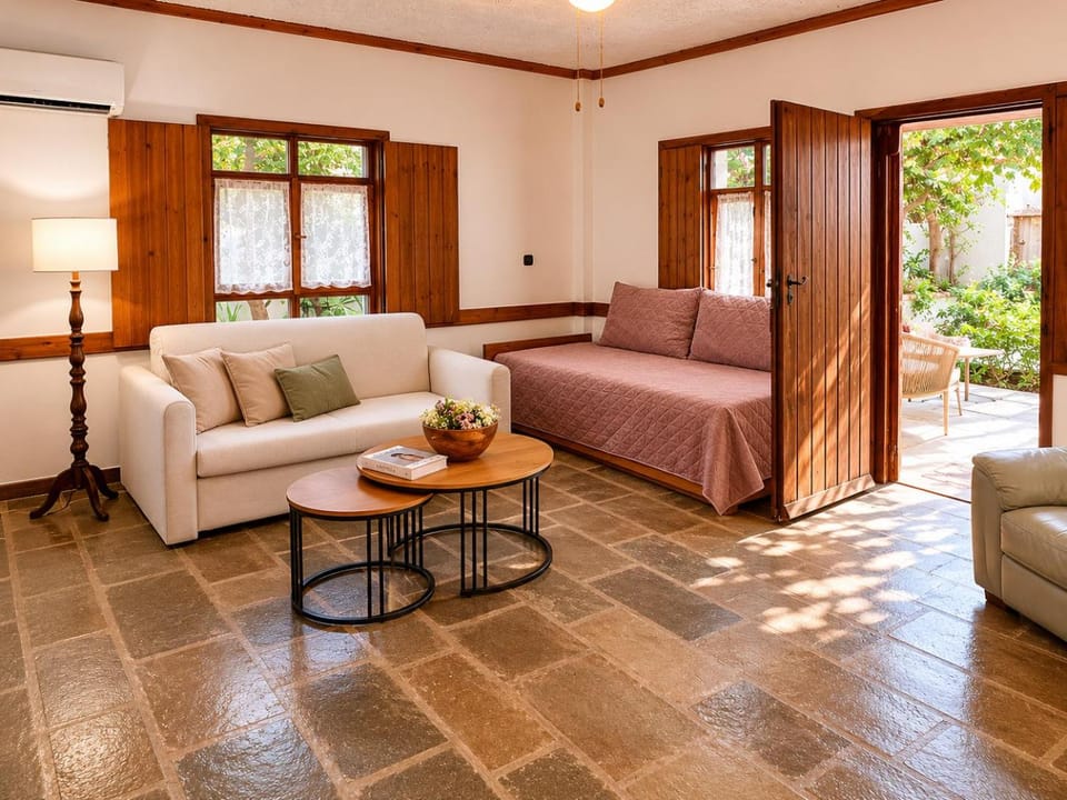 Bed, Library, Living room, Seating area, air conditioner