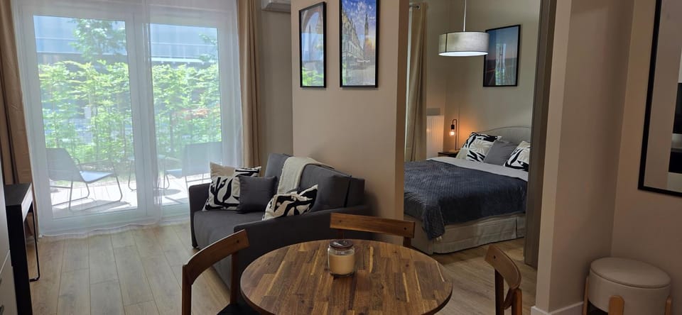 Bed, Living room, Seating area, Bedroom