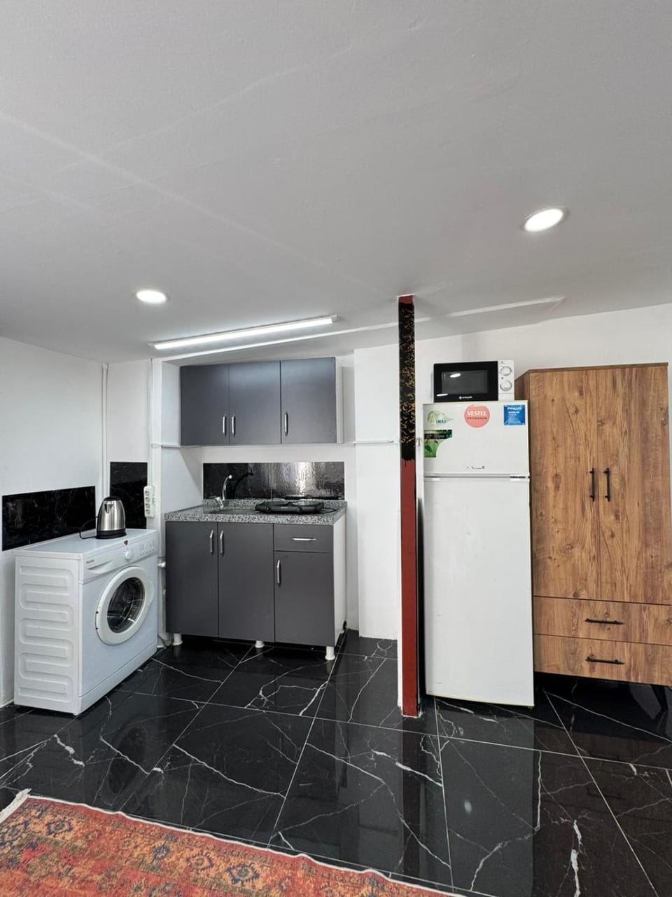 Kitchen or kitchenette, minibar, oven, washing machine