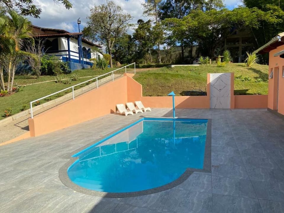Property building, Day, Natural landscape, Pool view, Swimming pool