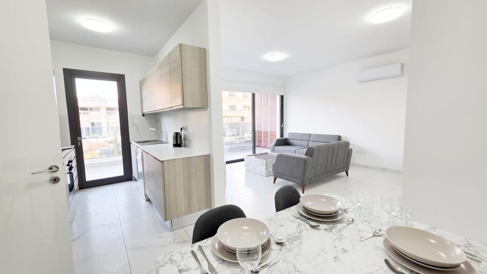 Kitchen or kitchenette, Living room, Seating area, Dining area, oven, stove, air conditioner