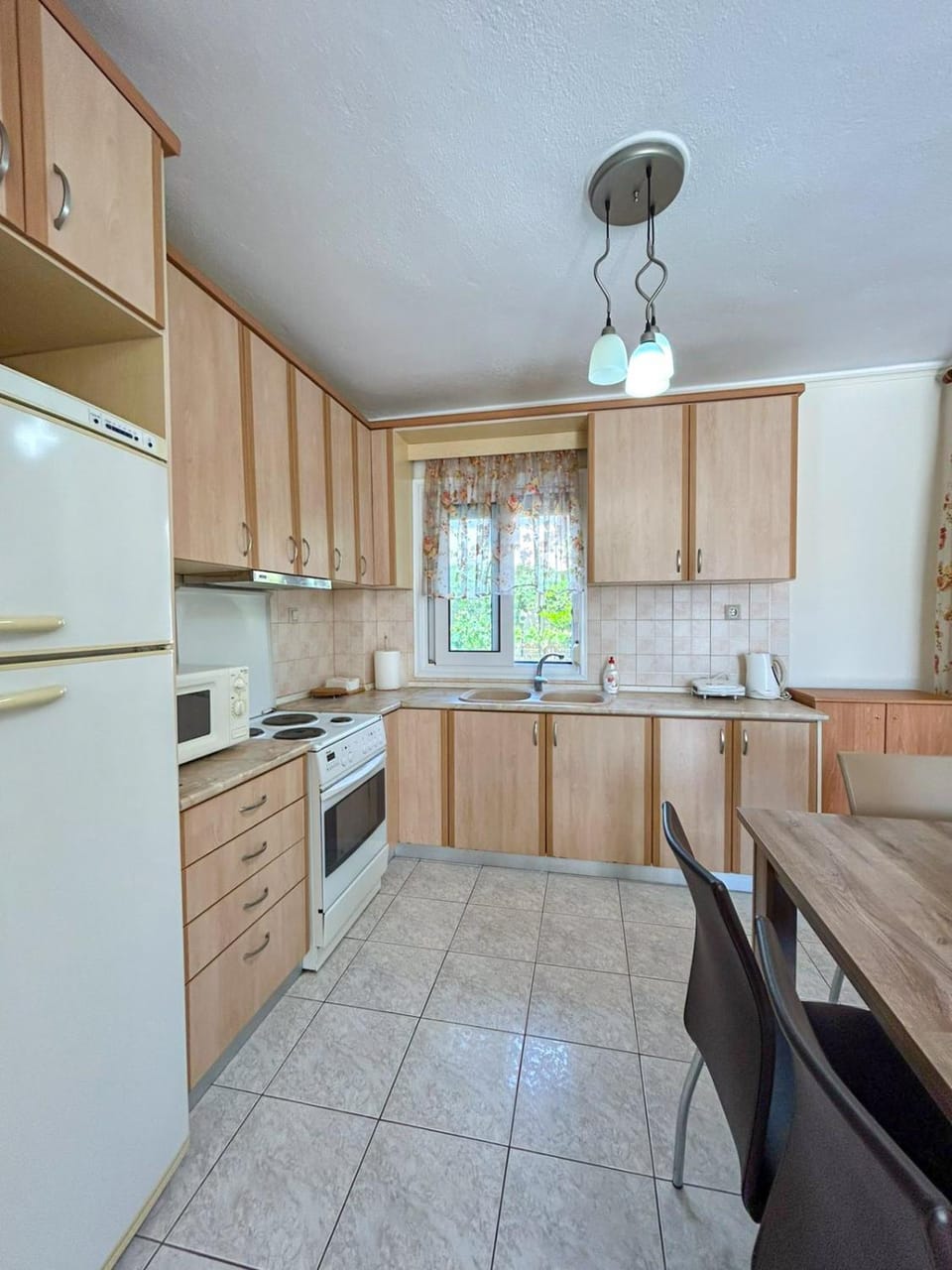 Kitchen or kitchenette, oven, stove, toaster