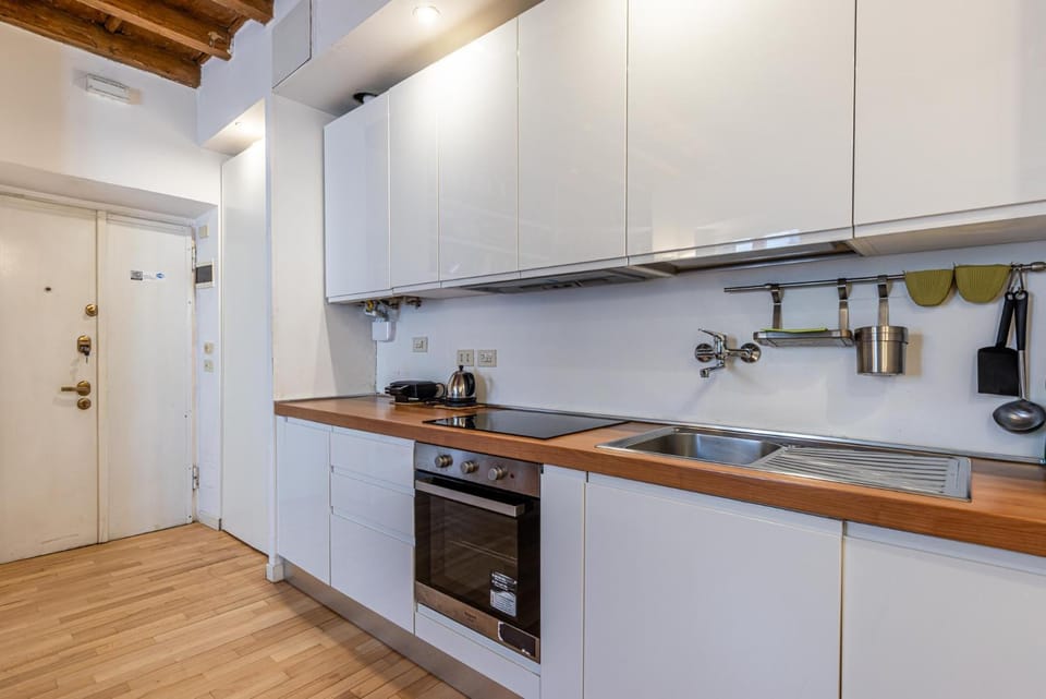 Kitchen or kitchenette, stove