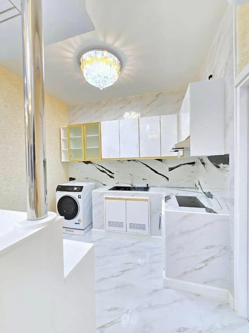 Kitchen or kitchenette, washing machine