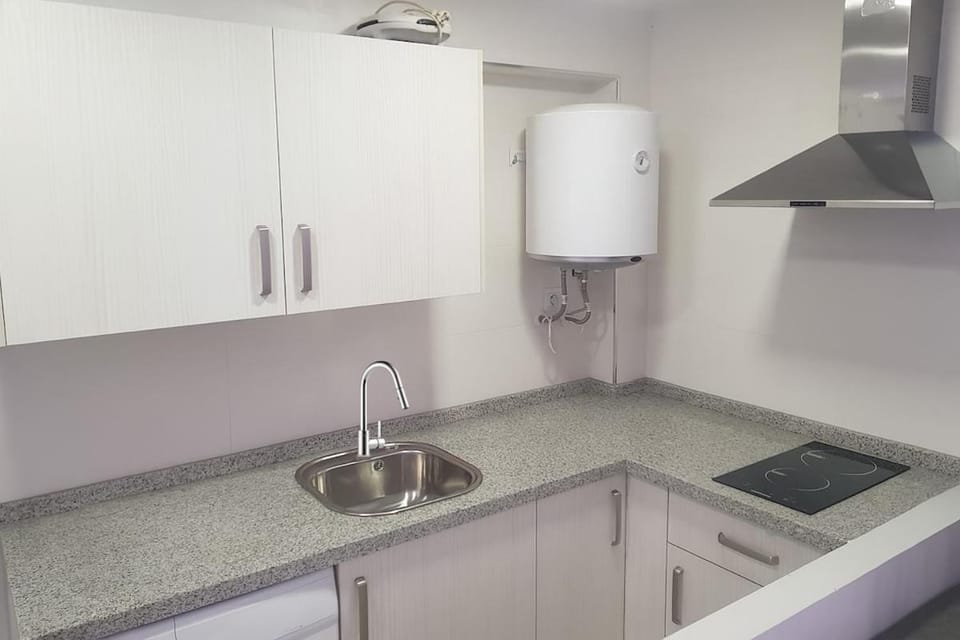 Kitchen or kitchenette, stove