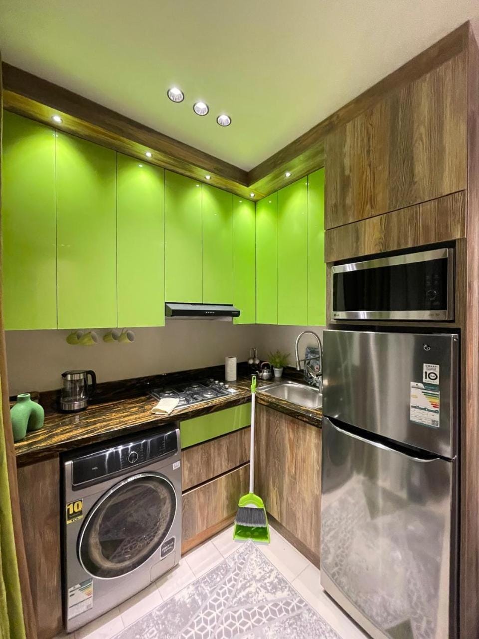 Kitchen or kitchenette, oven, stove, washing machine