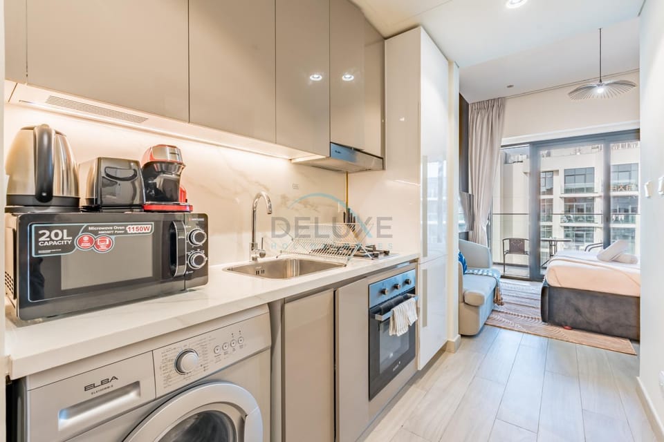 Coffee/tea facilities, Kitchen or kitchenette, stove, washing machine
