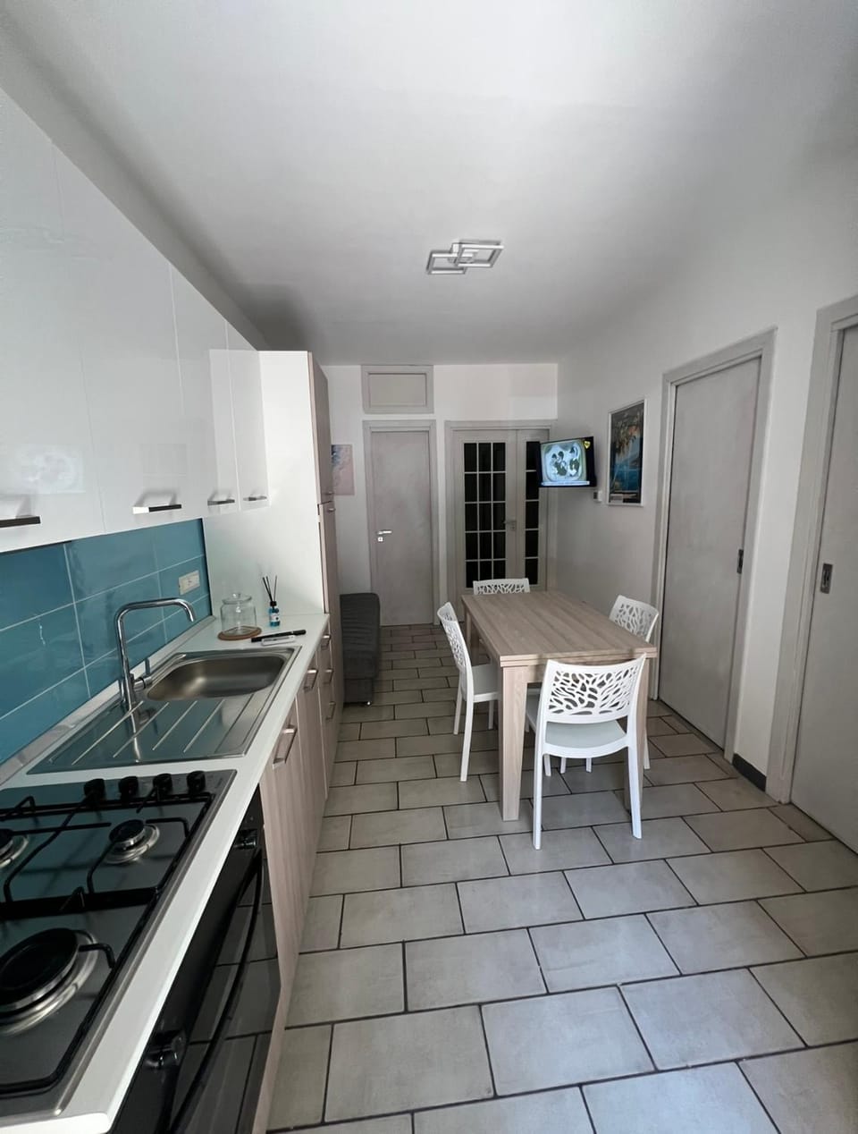 Kitchen or kitchenette, stove