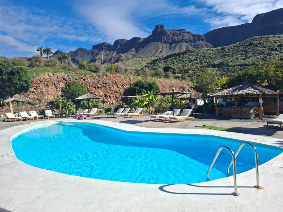 Nearby landmark, Natural landscape, Mountain view, Swimming pool, sunbed