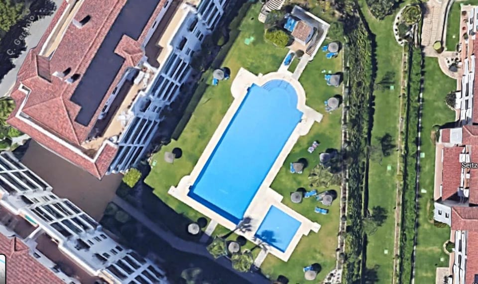 Swimming pool, sunbed