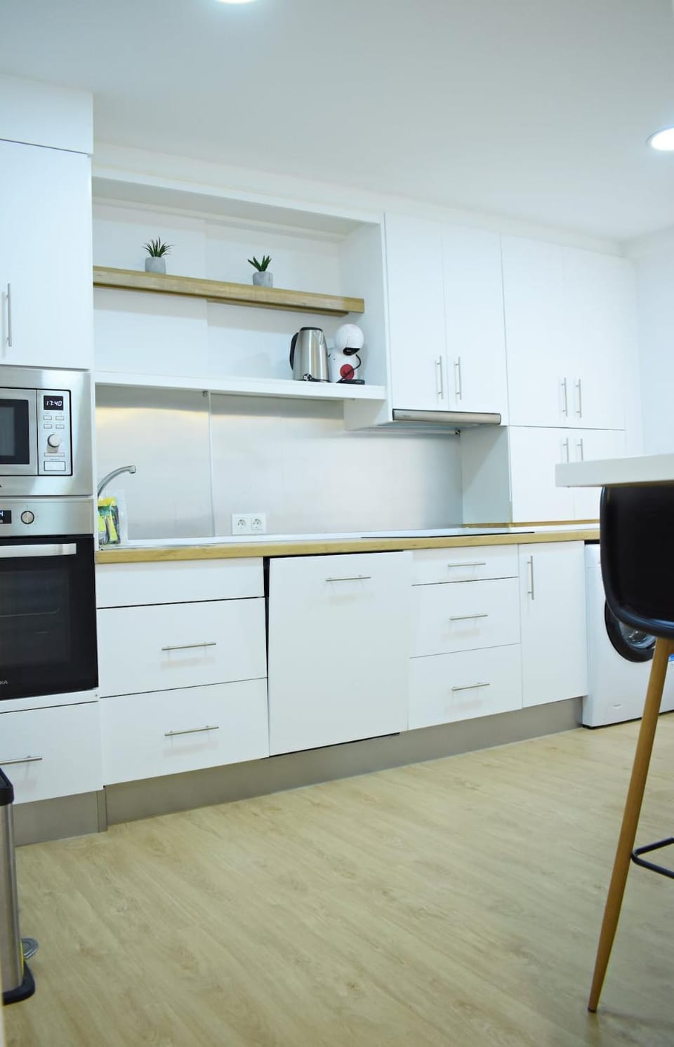 Kitchen or kitchenette, oven, stove, toaster