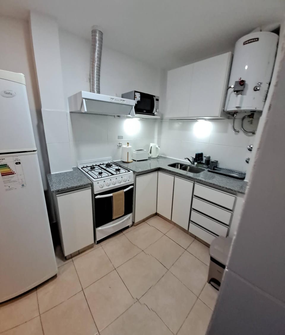 Kitchen or kitchenette, stove, toaster