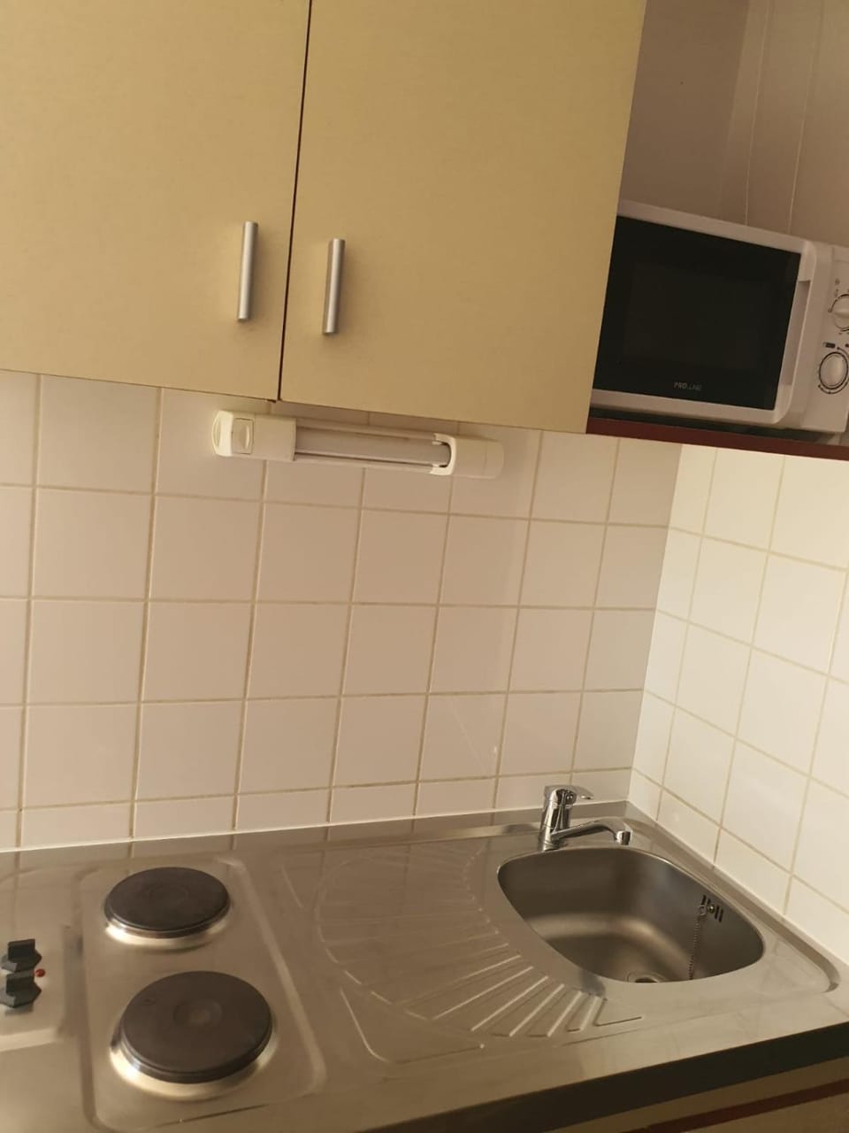 Kitchen or kitchenette, stove